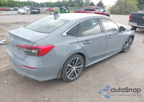 2022 Honda Civic Touring z USA, uszkodzony, nr VIN 2HGFE1F94NH313631